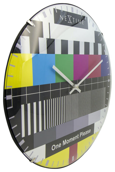 NeXtime Clocks wall clock with a 35 cm dome glass design, featuring a sleek modern look and left-side view.