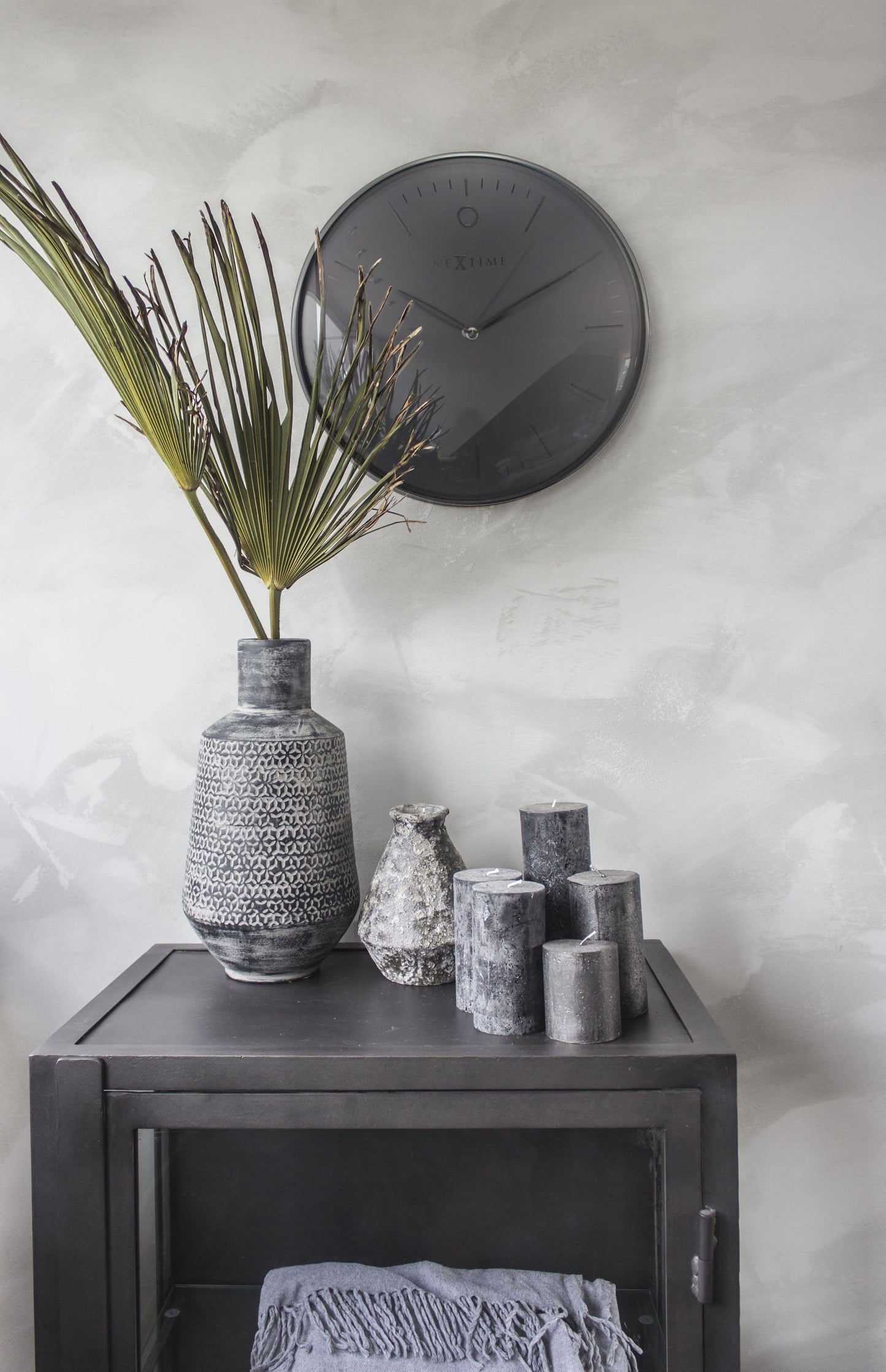 NeXtime Clocks wall clock with 40cm metal dome-shaped glass design, labeled 'Glamour', showcasing a modern, stylish timepiece.