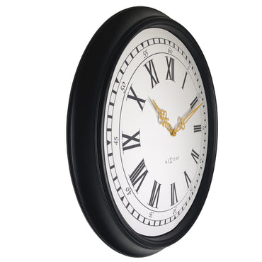 Large black and grey plastic NeXtime Chopin wall clock, 76cm diameter, showing a modern design with visible clock hands.