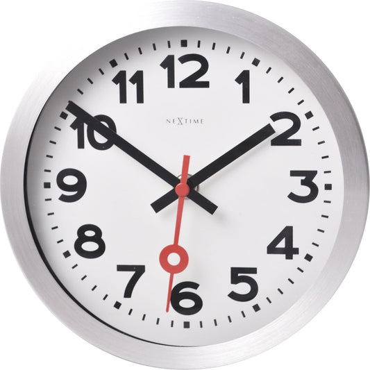 NeXtime Clocks aluminum wall or table clock with station number design, featuring a modern, minimalist style.
