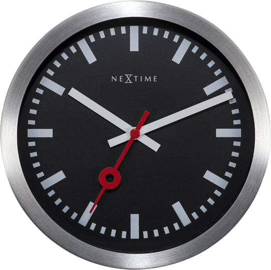 NeXtime Clocks black aluminum station stripe wall or table clock with modern design and clear clock face.
