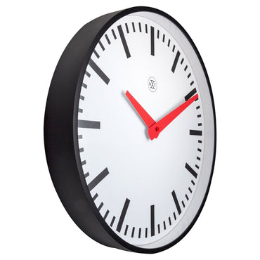 NeXtime Clocks Newcastle wall clock, 25.5cm, silent plastic design, showing the left side with black hour and minute hands.