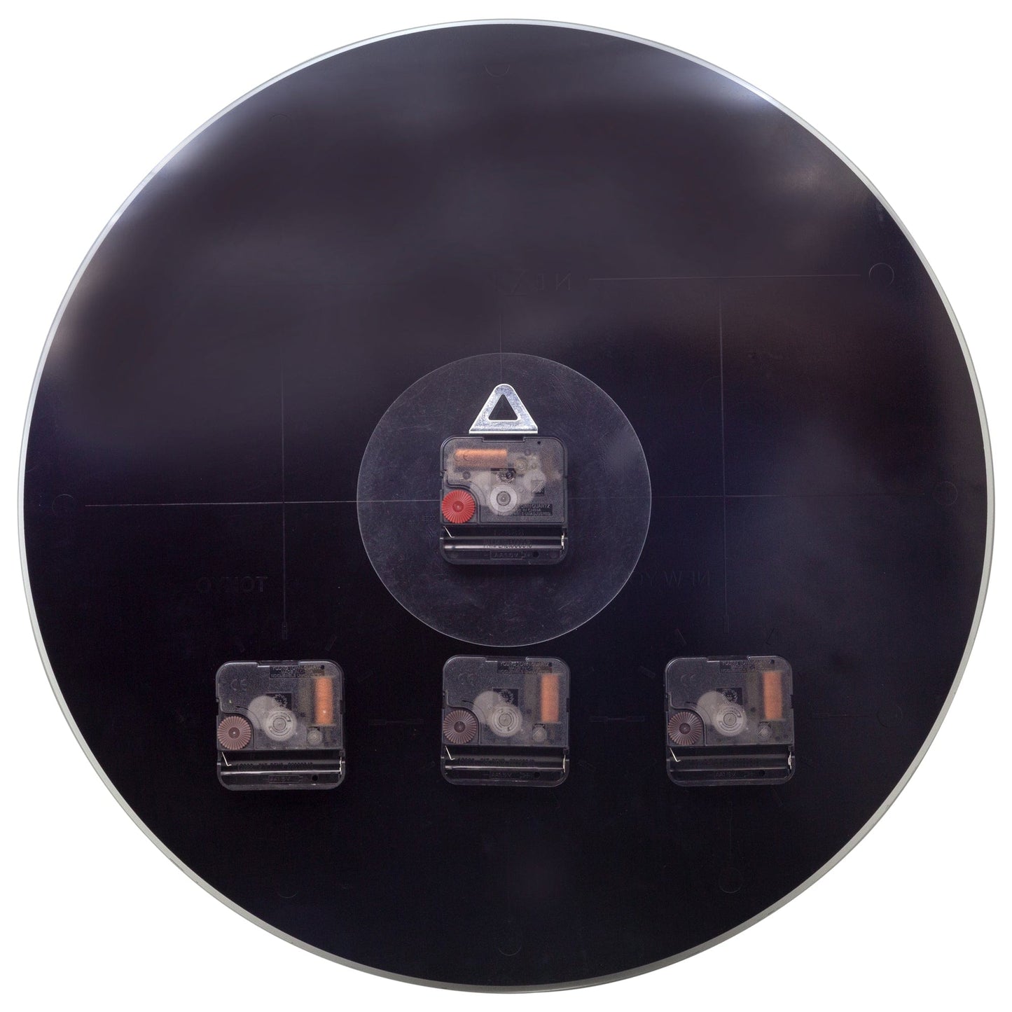 NeXtime Clocks 43cm silent glass wall clock with "Big City" design, showing a sleek, modern timepiece on a wall.
