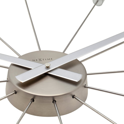 Vintage NeXtime Silent Wall Clock with stainless steel finish, 58cm diameter, featuring a sleek Plug Inn design.