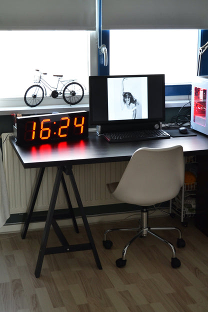 NeXtime Big D wall clock, plastic, 51.5 x 18 x 4.5 cm, black and white design, hanging on a wall.