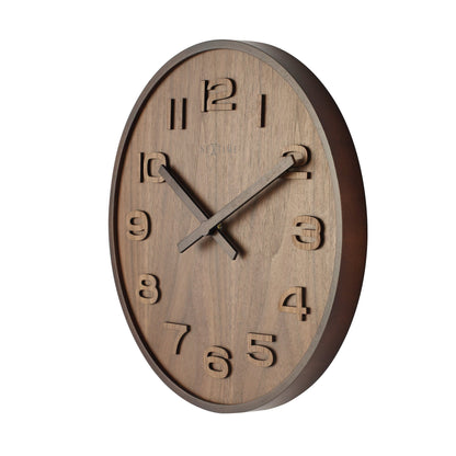 NeXtime Clocks Wood Wood Wood Medium wall clock, 35 cm diameter, natural wood finish, showing the right side of the clock.