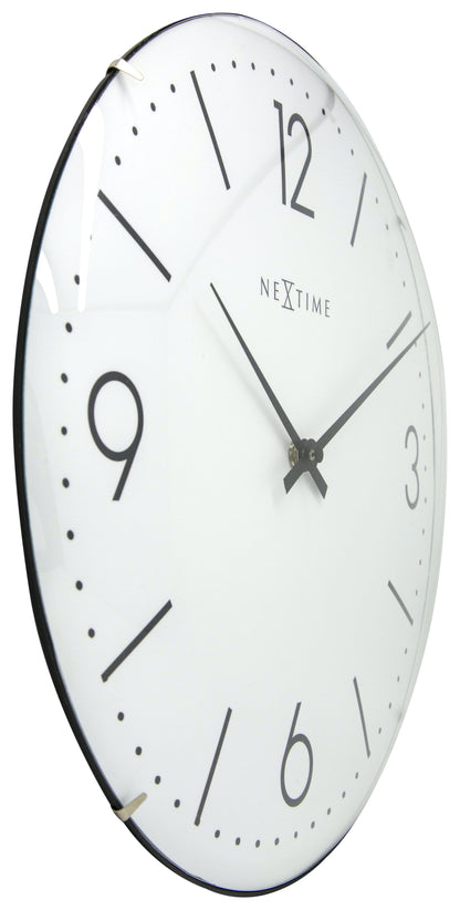 NeXtime Clocks Basic Dome wall clock with 35 cm diameter and dome glass, shown from the left side.