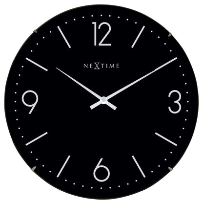 NeXtime Clocks Basic Dome wall clock with a 35cm dome glass cover, modern design, white face, and black hour and minute hands.