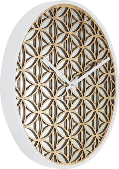 NeXtime Clocks Bella Mirror wall clock with 50cm wooden frame and mirror accents, shown from left side in image.