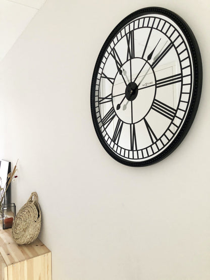 NeXtime Clocks Cleopatra mirror wall clock, 56 cm with reflective mirror surface and elegant design.