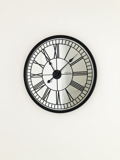 NeXtime Clocks Cleopatra mirror wall clock, 56 cm, round with a reflective mirror face for stylish home decor.