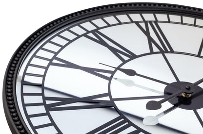 NeXtime Clocks Cleopatra mirror wall clock, 56 cm with reflective mirror finish, stylish timepiece for modern home decor.