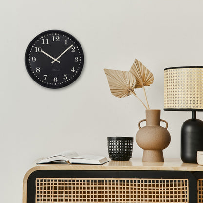 NeXtime Dickens wall clock, 30cm diameter, black and white plastic design, silent movement, decorative timepiece for modern interiors