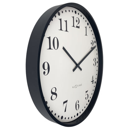 Black and white NeXtime Dickens Large wall clock, 50cm, silent movement, plastic frame, shown from left side.