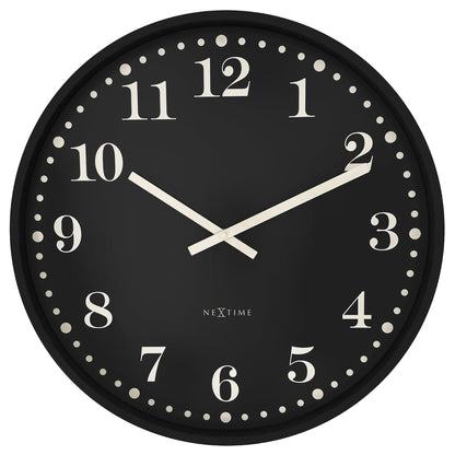 NeXtime Dickens Large black and white 50cm wall clock with silent mechanism and plastic frame, front view.