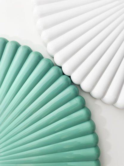 White and green NeXtime Mousse wall clock, 40cm, silent quartz movement, made of polyresin with a modern design.