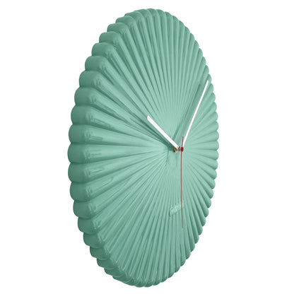 NeXtime Mousse wall clock, 40cm, white and green polyresin design, silent movement, shown from left side.