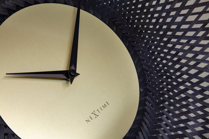 Close-up of NeXtime Vortex wall clock in brown and black bamboo with a 60cm silent design and modern style.