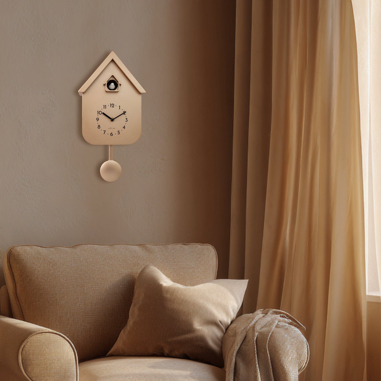 NeXtime Twitter wall clock with pendulum, 21.5x41.5x8.5cm, featuring a modern cuckoo design and interior details.