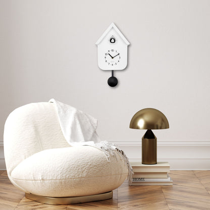 NeXtime Twitter wall clock with pendulum, 21.5x41.5x8.5cm, featuring a modern design and cuckoo clock elements.