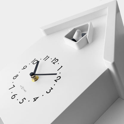 NeXtime Twitter wall clock with pendulum, 21.5x41.5x8.5cm, featuring a modern cuckoo design and detailed clock face.