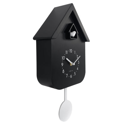 NeXtime Twitter wall clock with pendulum, 21.5x41.5x8.5cm, round face, black frame, and cuckoo feature, left side view