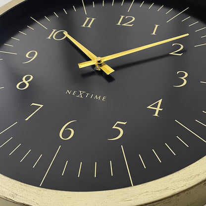 NeXtime Galaxy wall clock, 40cm diameter, black and white plastic design with a starry galaxy pattern.