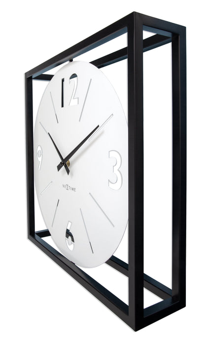 Black and white NeXtime wall clock, 40x40cm metal design with minimalist hour and minute hands, right-side view.