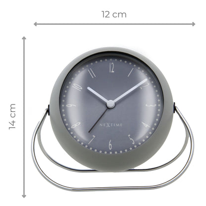 NeXtime Bubble Alarm Clock with metal frame, silent operation, measuring 14x12x8cm, featuring a modern, rounded design.