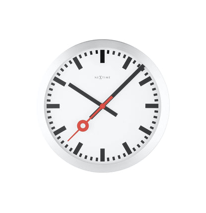 NeXtime Station Stripe aluminum wall or table clock with a modern striped design and minimalist style.