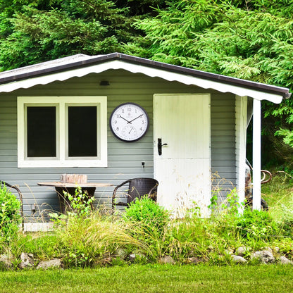 Weatherproof outdoor garden clock with thermometer by NeXtime Clocks, 30.5 cm diameter, featuring a marigold-colored face.