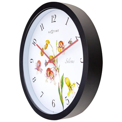 NeXtime Clocks weatherproof outdoor garden clock, 30.5 cm Silene model, showing a stylish clock face with black hands and white background.