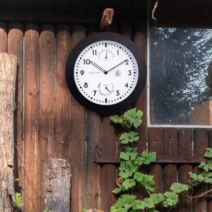 Weatherproof garden wall clock by NeXtime Clocks featuring a 25.5 cm Daisy design, suitable for outdoor use.