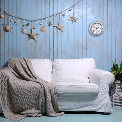 NeXtime Tide wall clock with 22cm galvanized silver finish and tide status display, suitable for indoor use.