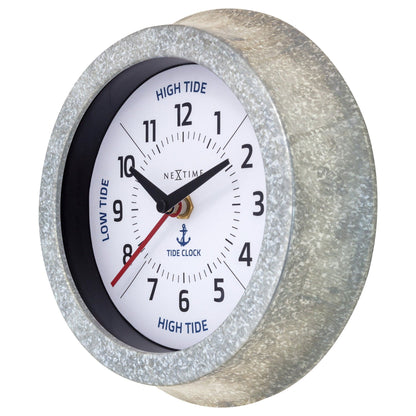 Galvanized silver NeXtime Tide wall clock with tide status display, 22cm diameter, showing side view of clock face.