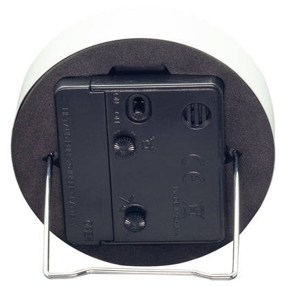 Small NeXtime Clocks metal table alarm clock with light function, silent operation, measuring 9x9x7.5cm, back view.