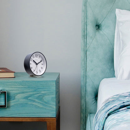 NeXtime Clocks Reflect table alarm clock with light function, silent operation, plastic construction, measuring 12.5x13x5.5cm.