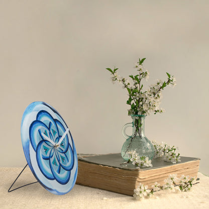 Blue NeXtime Cosmo Table Wall Clock, 20cm diameter, silent movement, with tempered glass finish, suitable for wall or tabletop display.