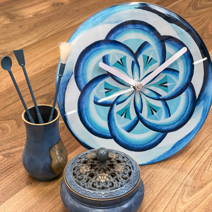 Blue NeXtime Cosmo Table Clock with 20cm tempered glass face, silent operation, designed for wall or table display.
