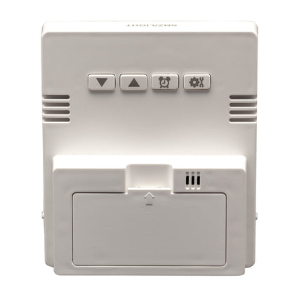 NeXtime digital table alarm clock with back display, compact size, and "Wake Up" label, made of RCC-ABS material.