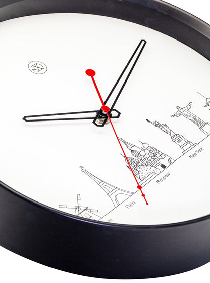 NeXtime Clocks wall clock with 30 cm plastic design featuring a Worldtour theme, detailed view showing clock face and design elements.