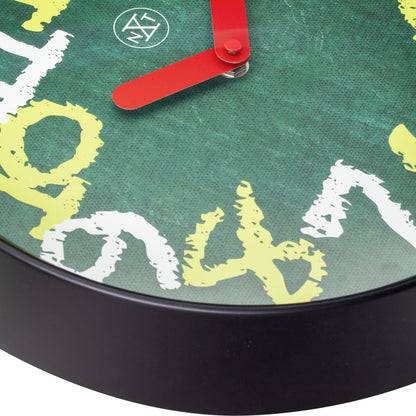 Green NeXtime wall clock, 30cm silent plastic clock with chalkboard design, featuring clear clock face and minimalist style.