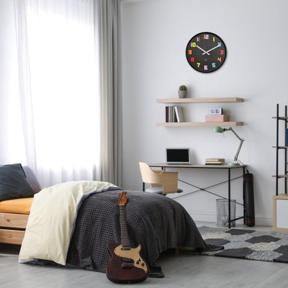 NeXtime Clocks black and multicolour 35cm silent wall clock with game-themed design, made of durable ABS material.