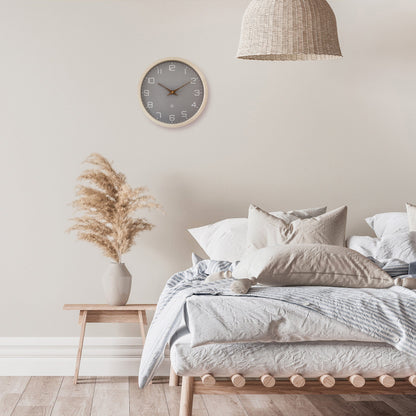 NeXtime Clocks 30cm silent wall clock with eco-friendly paper and bioplastic design, stylish and modern home decor accessory.