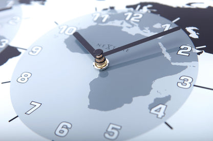 NeXtime Clocks wall clock with glass face, world time design, 50x18.6x3.6 cm, titled 'Mondial'.
