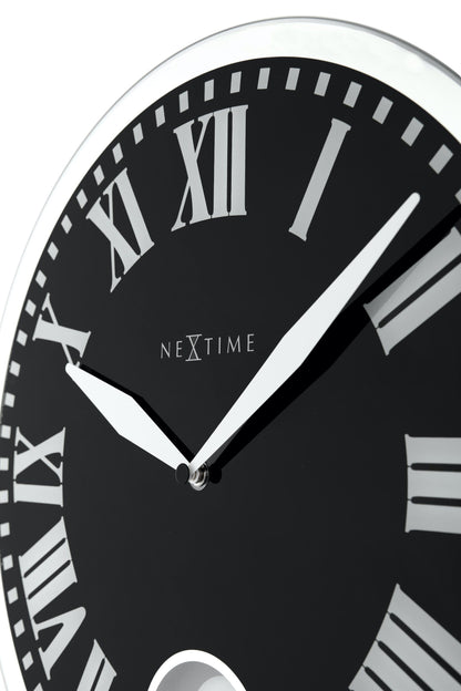 NeXtime Clocks Romana wall clock with glass face, 43 x 4.2 cm, featuring a stylish design and clear time display.