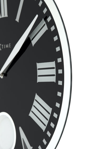 NeXtime Clocks Romana wall clock with glass face, 43x4.2 cm, featuring a stylish design and clear time display.