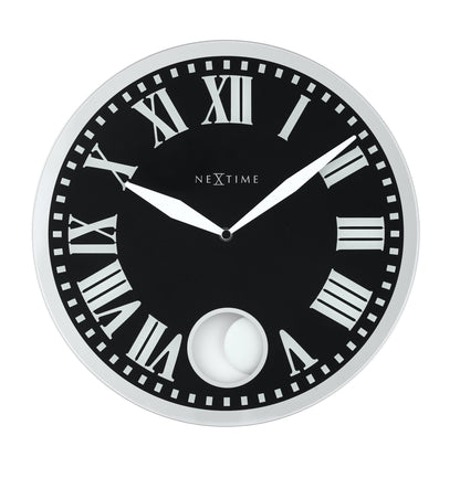 NeXtime Clocks Romana wall clock with glass face, 43cm diameter, featuring elegant design and black clock hands.