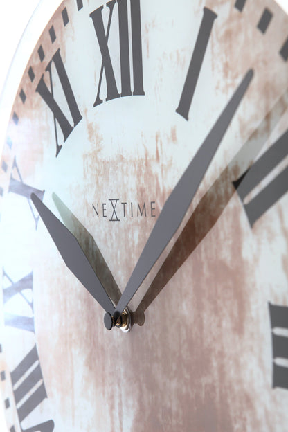 NeXtime Clocks Romana wall clock with glass face, 43 x 4.2 cm, featuring a stylish design and minimalist time display.