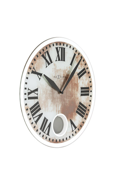 Wall clock by NeXtime Clocks with a glass face, measuring 43 x 4.2 cm, featuring a stylish Romana design.
